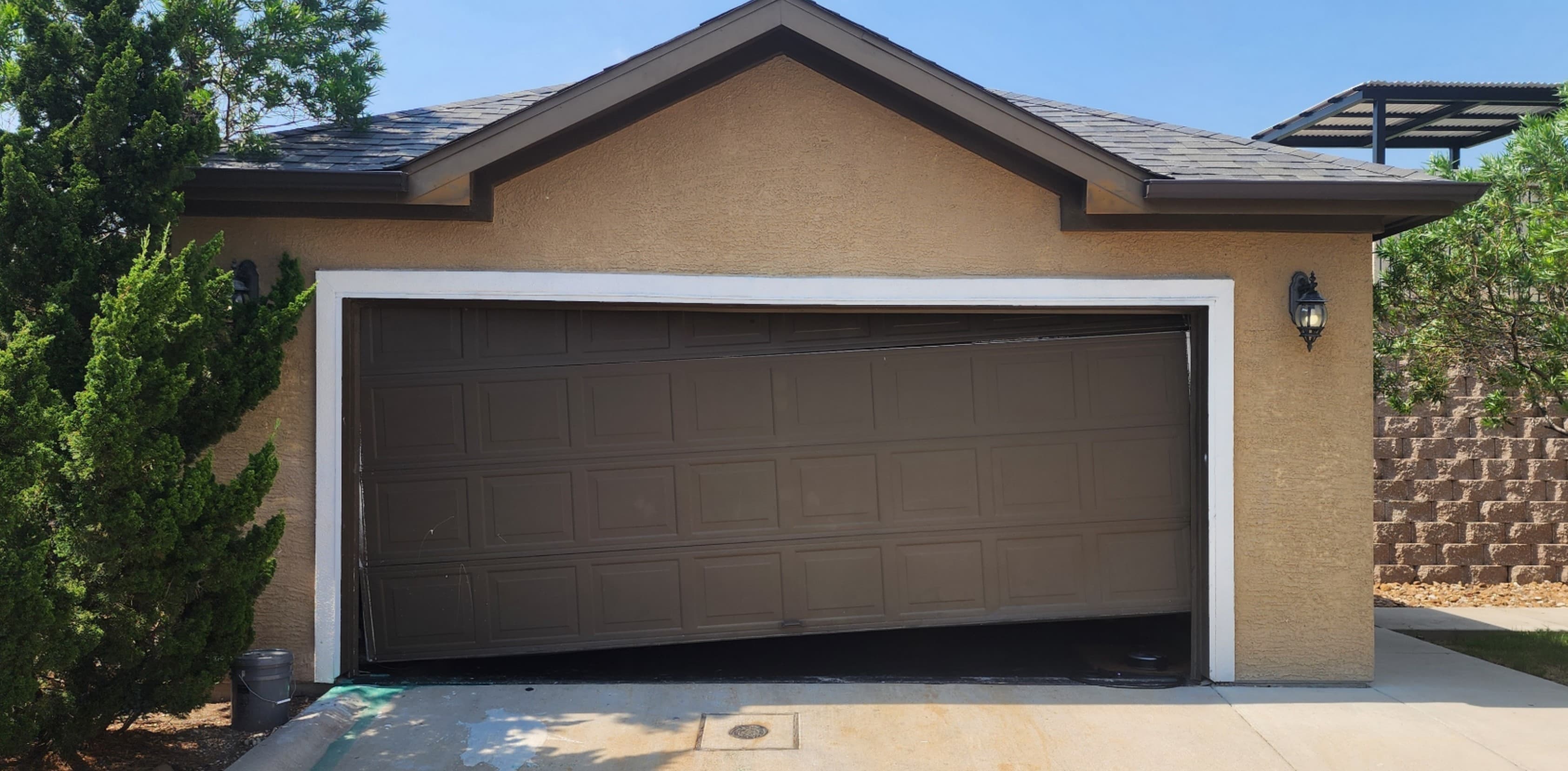 Emergency Garage Door Failures: What to Do Before the Pros Arrive